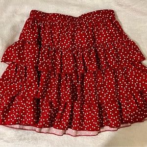 Red skirt with white hearts.
